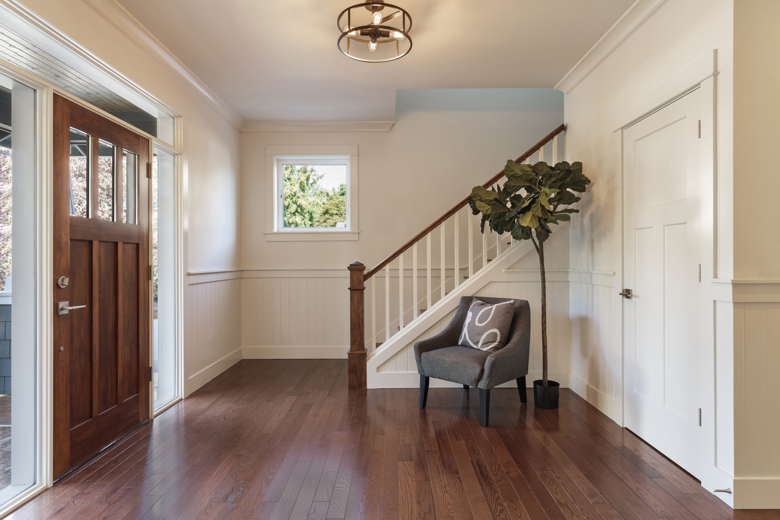 lake oswego, oregon, usa,armchair and tree in house entryway